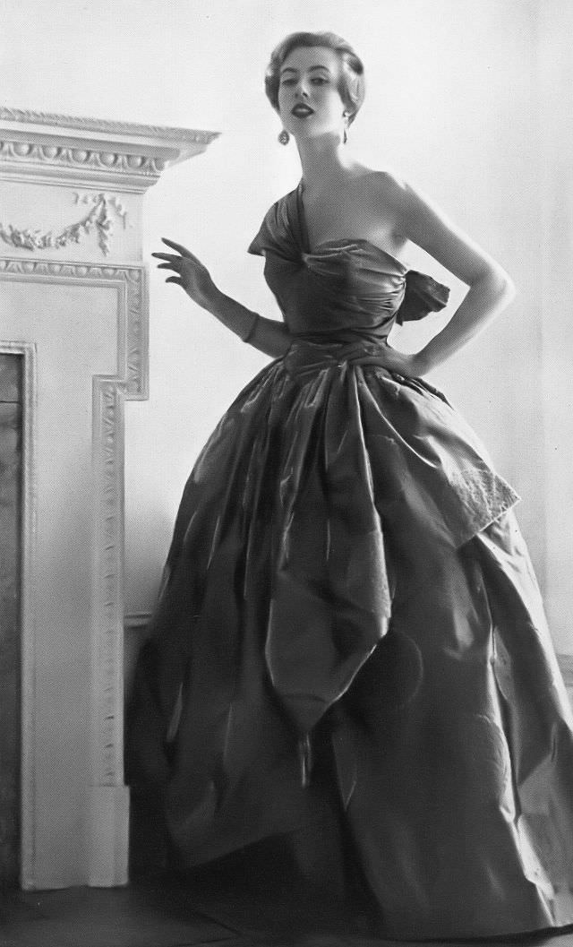 Pat O'Reilly in an ash-gray taffeta ball gown by Victor Stiebel, Harper's Bazaar UK, October 1952.