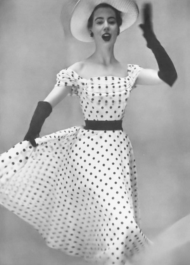 Pat O'Reilly in a polka-dot organza dress by Julian Rose, Harper's Bazaar UK, May 1953.