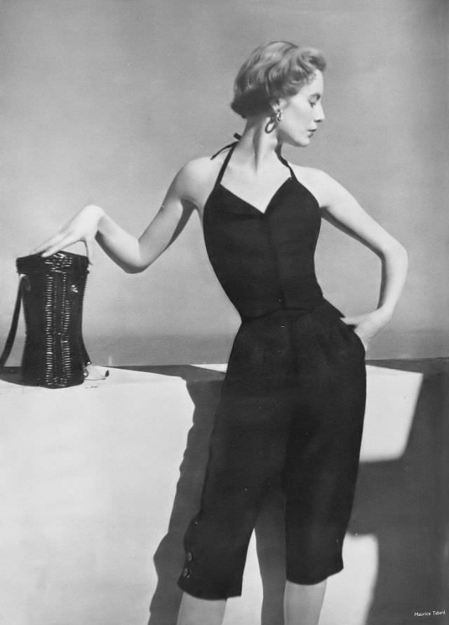 Pat O'Reilly in black linen slacks and halter top by Londonus, Harper's Bazaar UK, June 1950.