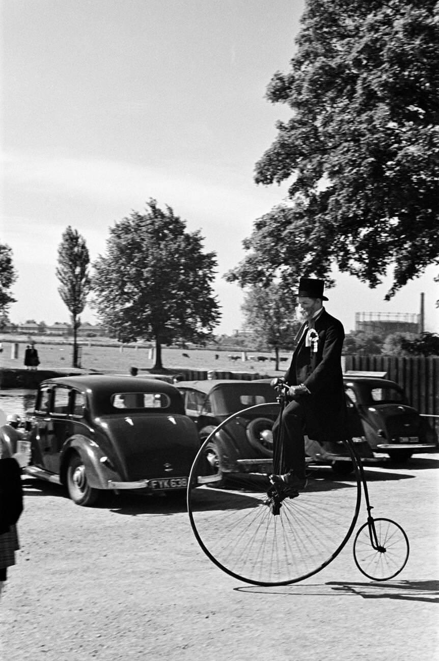 David Wilde observing a rider on a Humber Roadster, West Midlands, May 18, 1951.