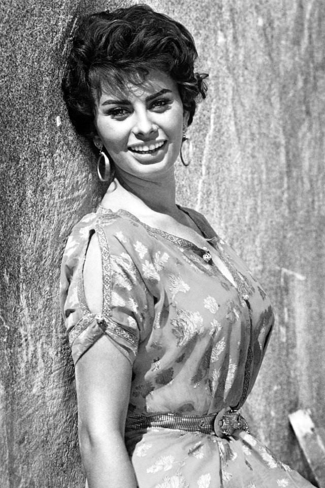 Sophia Loren posing against a wall, 1950.
