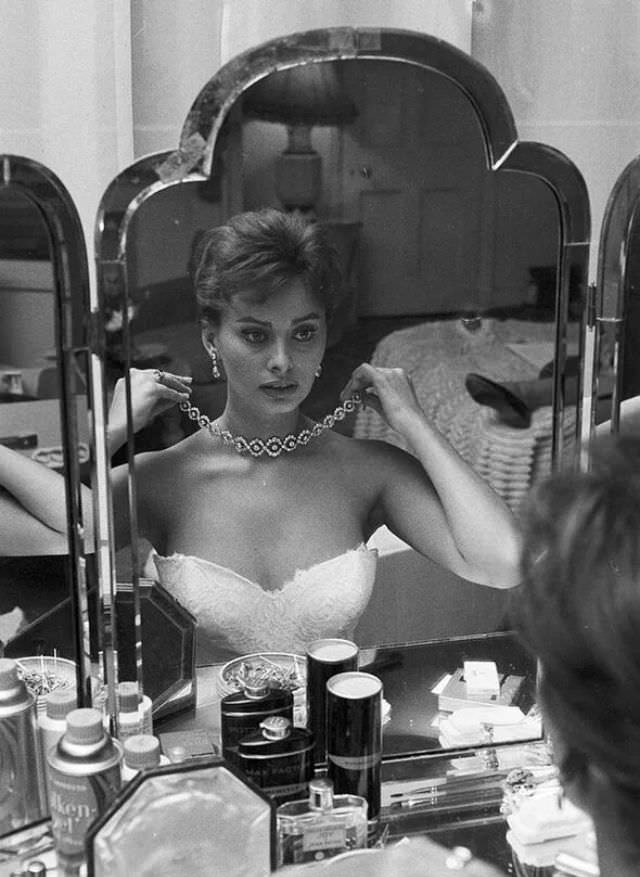 Sophia Loren preparing for her meeting with Queen Elizabeth, London, November 1957.