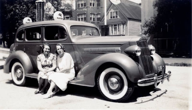 Young ladies on a 1936 Packard 120 Touring Sedan, Illinois, circa 1936.