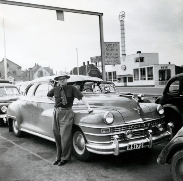 Man with a 1946-48 Chrysler, Hallands län, Sweden, circa 1940s.