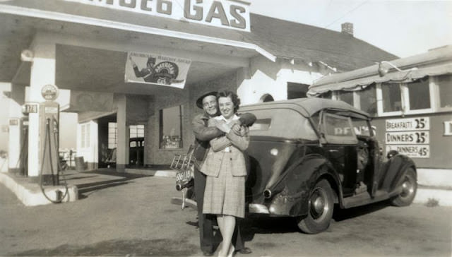 Couple with a 1935 Ford Phaeton in Pennsylvania, 1941.