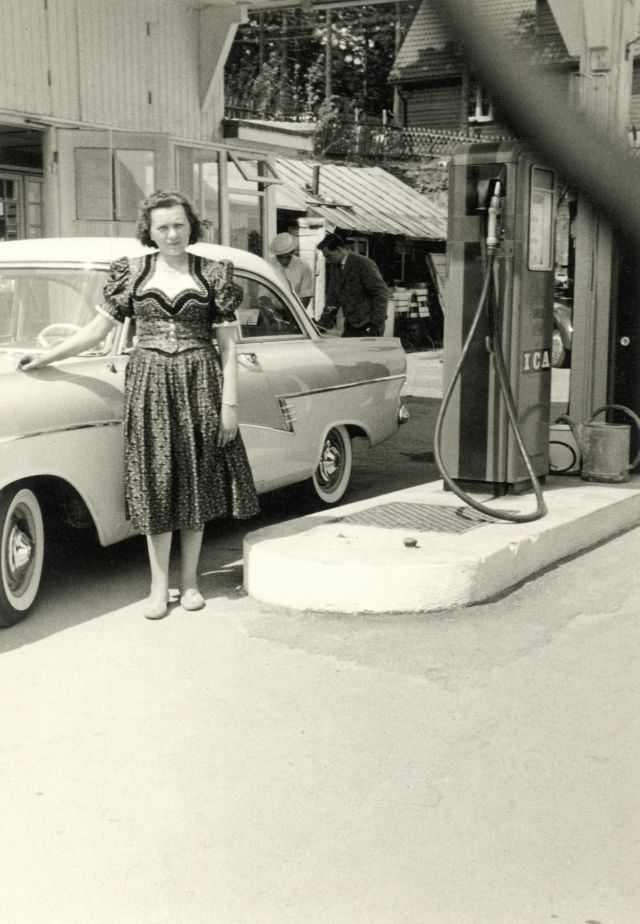 Lady in a Dirndl with a Ford Taunus 17 M De Luxe, circa 1950s.