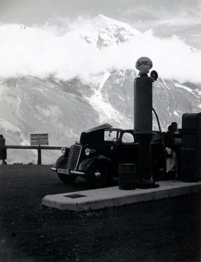 Opel refueling at Shell station, Grossglockner High Alpine Road, circa 1930s.