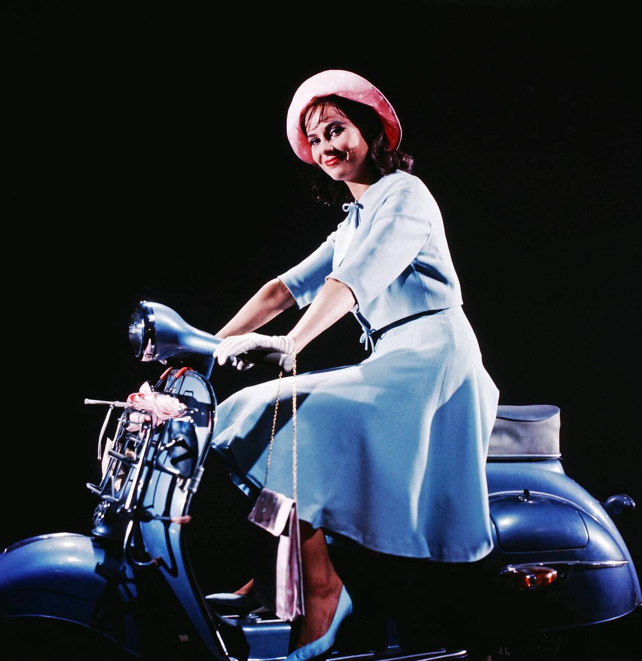 Couple with a 1949 Chevrolet Fleetline Deluxe, Italy, circa 1949.