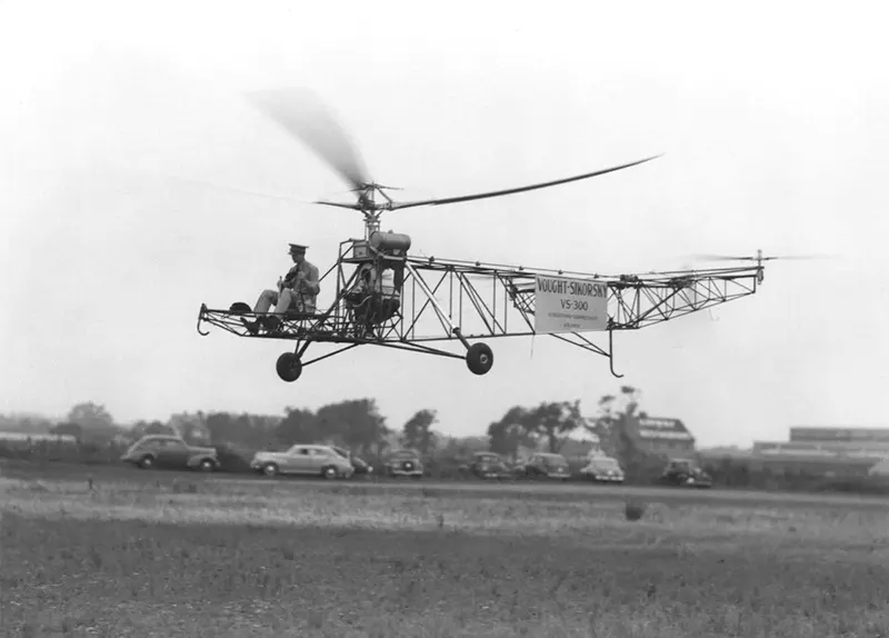 Captain H. Franklin Gregory operating the VS-300 helicopter.