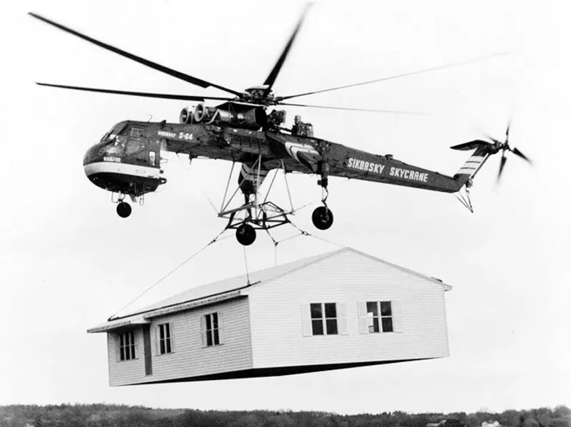 Sikorsky S-64 Skycrane transporting a house.