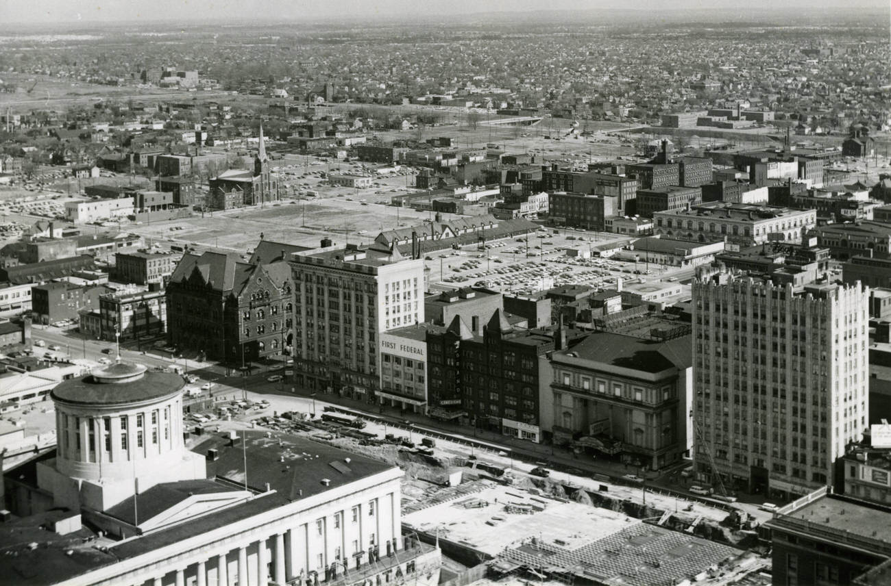 Aerial view of Capital Square, featuring construction of the underground parking garage, 1964.