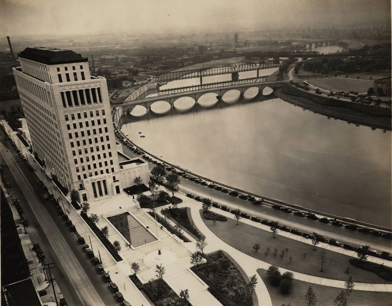 Aerial view of the Columbus riverfront, showing the Olentangy-Scioto Intercepting sewer, circa 1930.