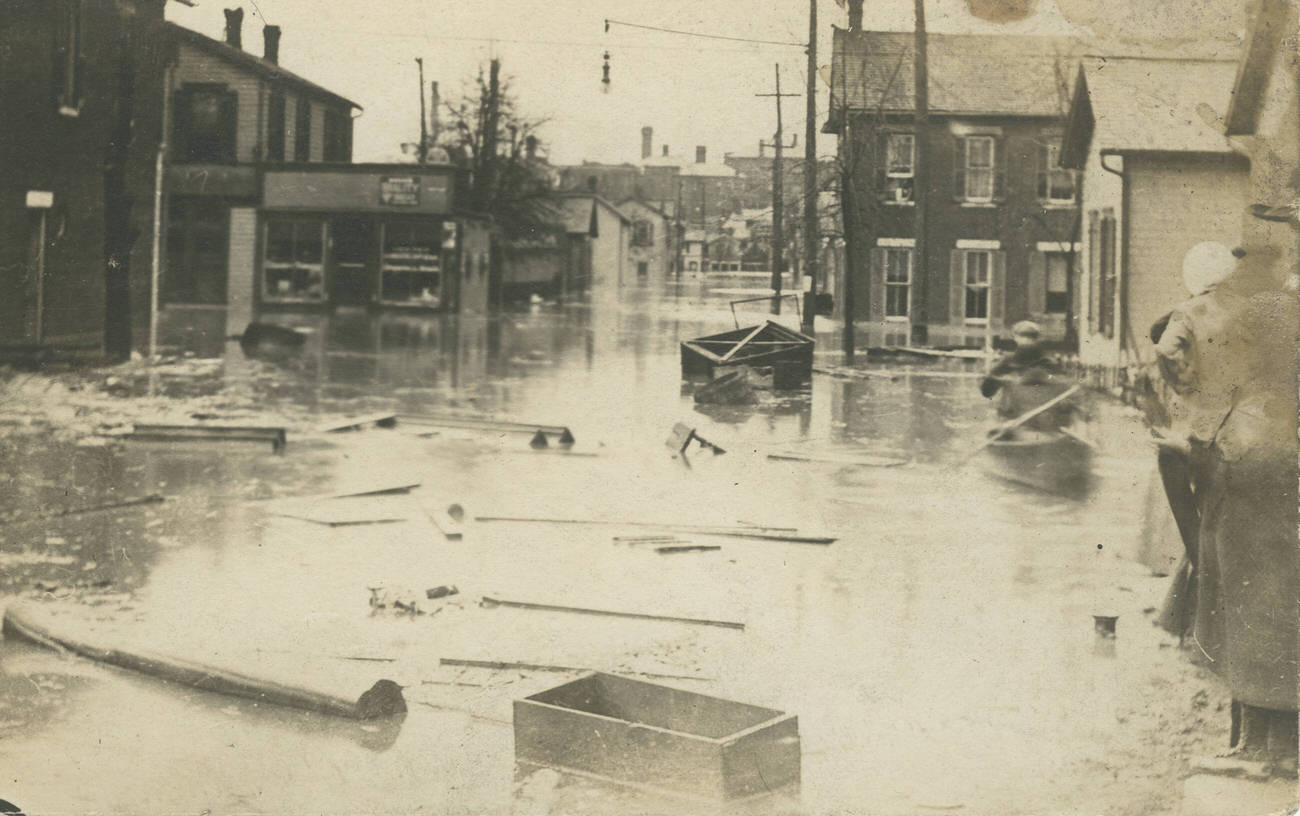 Scene of the 1913 flood in Columbus, showing floating debris, possibly at 516 W. State St., 1913.