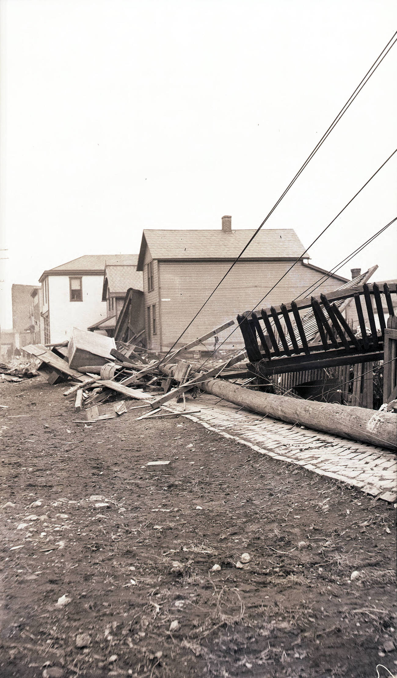 View of downed utility pole and debris from the 1913 flood in Columbus, Ohio, 1913.