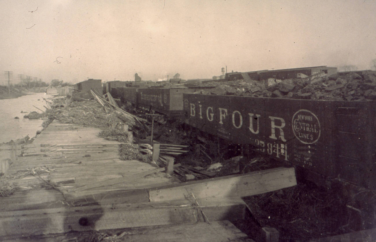 Big Four railcar derailed by the 1913 flood near the Toledo and Ohio Central Railroad yard in Franklinton, 1913.