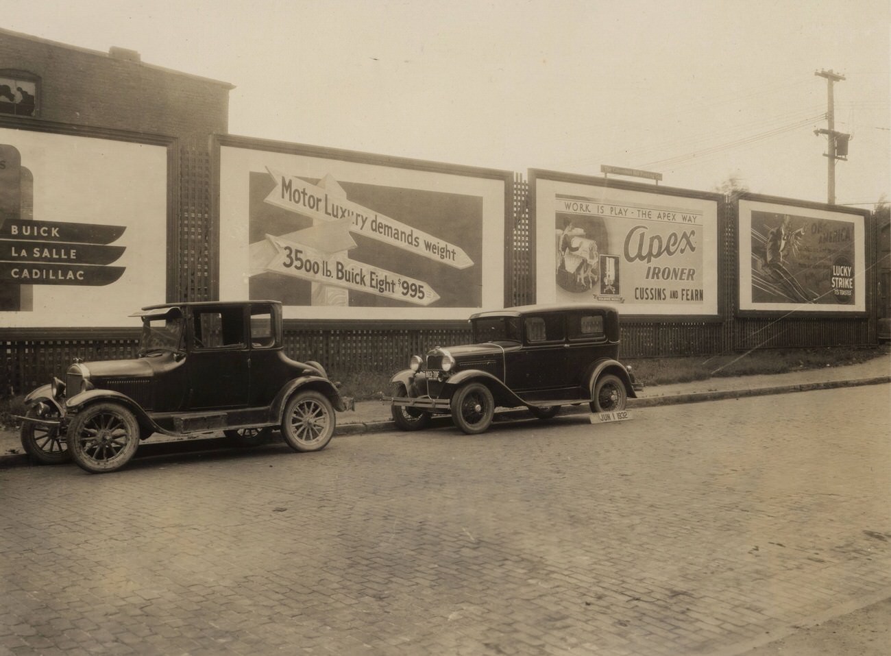 Billboards along Pennsylvania Avenue before sewer construction, photo witnessed by C. W. Schoene, June 1, 1932.