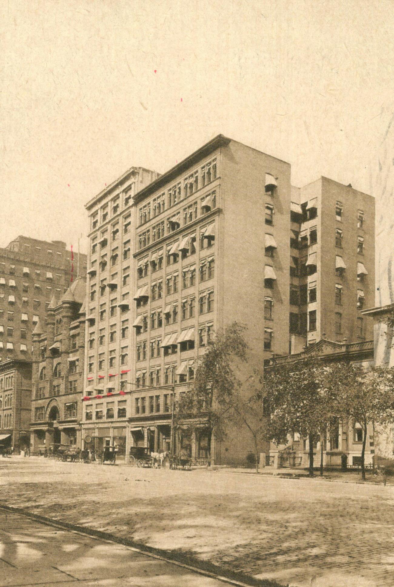 Board of Trade Outlook and Spahr Buildings on Capital Square, view of East Broad Street, sender marks work location, 1880s