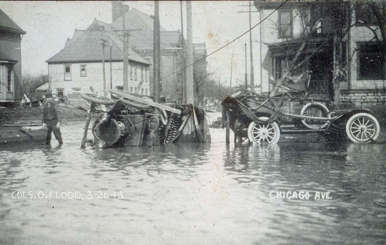 Chicago Avenue flood destruction with overturned car, March 26, 1913.