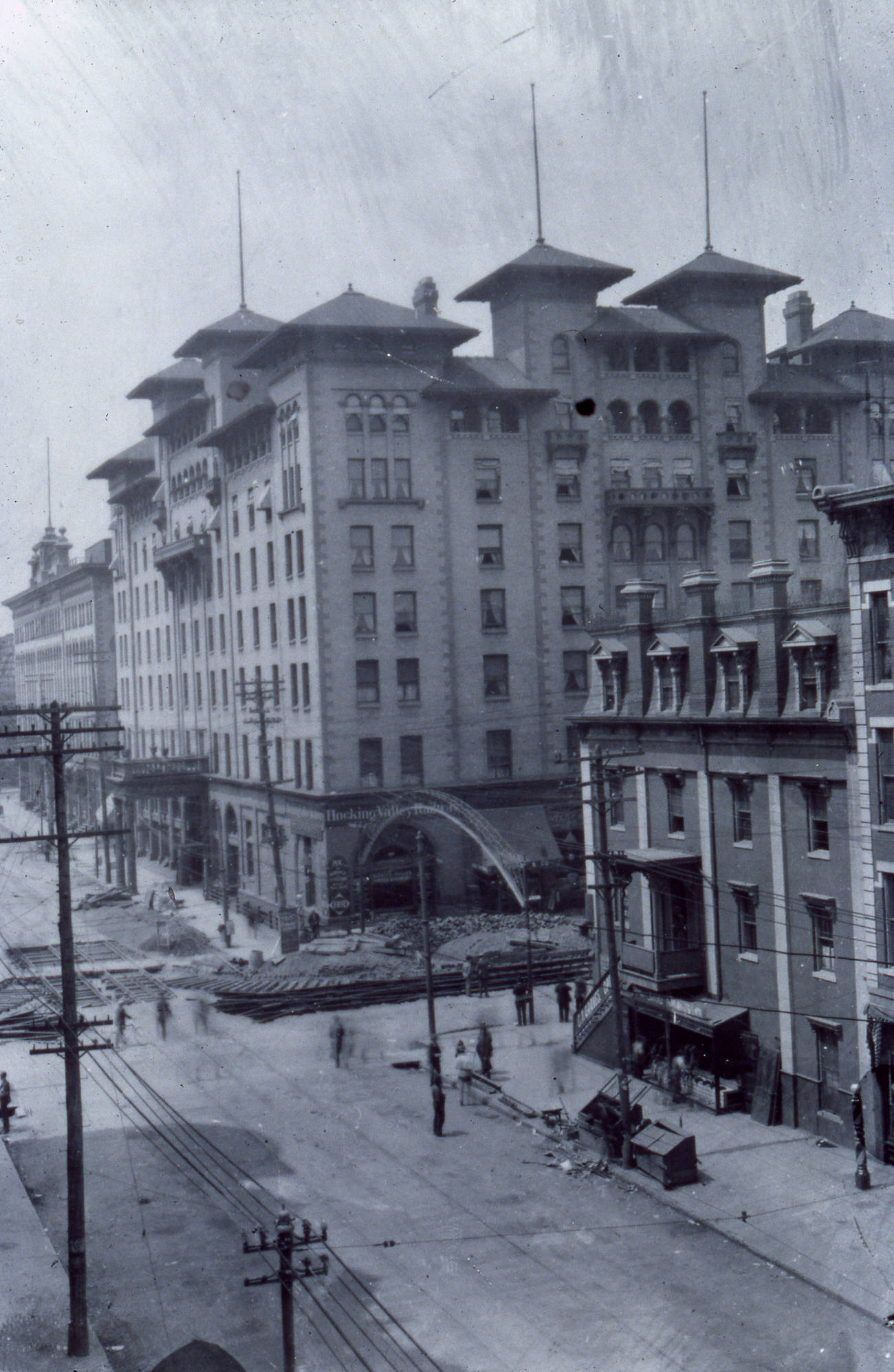 Third Chittenden Hotel during construction of streetcar lines along High and Spring Streets, circa 1895.