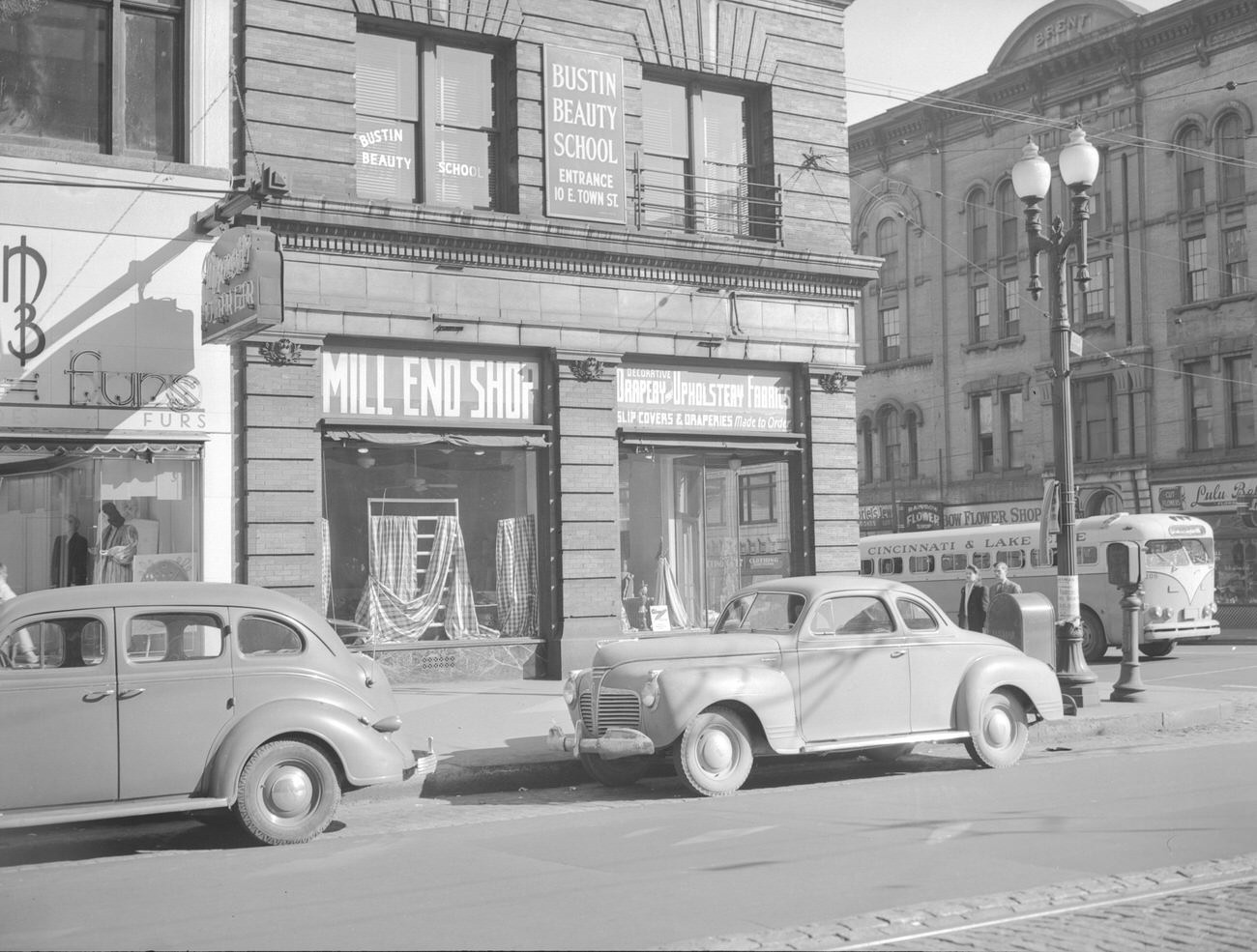 Brent and Grange Buildings at E Town Street and S High Street, featuring Bloom Fur Company and Rainbow Flower Shop, 1947