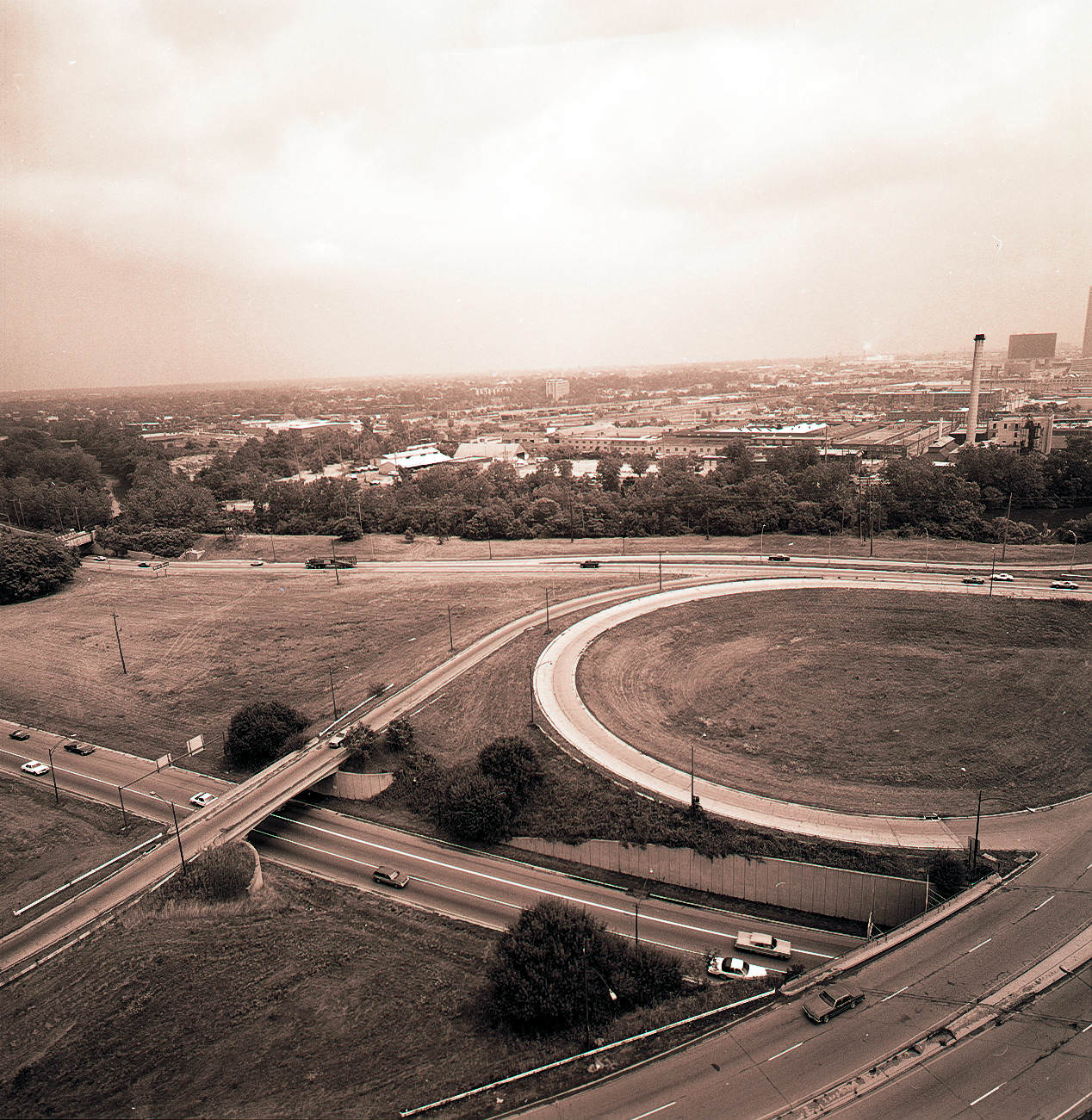 Aerial views over Route 315 near Dublin Road, showing the Hyatt Regency Hotel, 1984.
