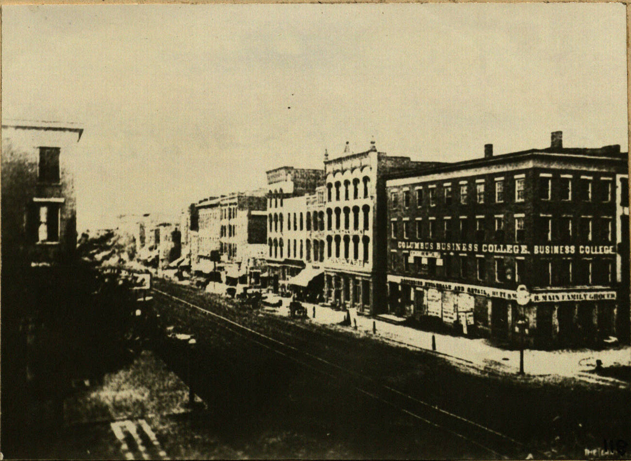 Corner of North High and Broad Street, Columbus, showing Main's and Hayden's Groceries, circa 1880.