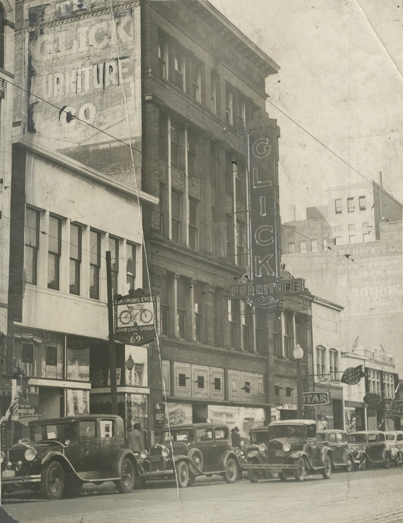 Glick Furniture Company and neighboring businesses on East Long Street, Columbus, 1907
