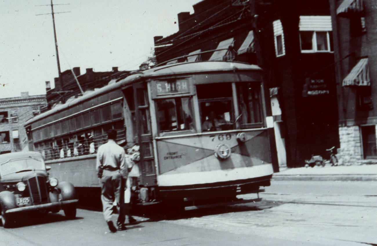 Streetcar No. 769 boarding passengers on High St. near 11th Ave., 1947.