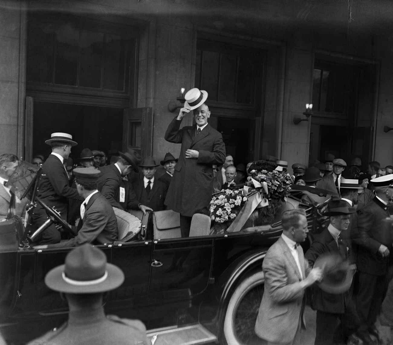 President Woodrow Wilson acknowledges onlookers in Columbus, Ohio, during his League of Nations tour, 1919