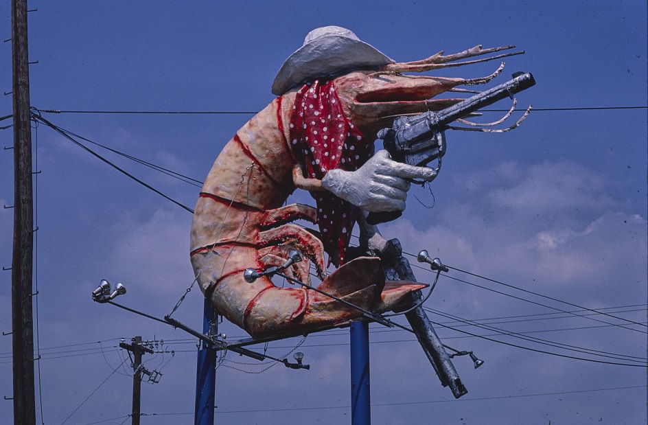 Christie's Restaurant sign featuring cowboy shrimp in Houston, Texas, 1983