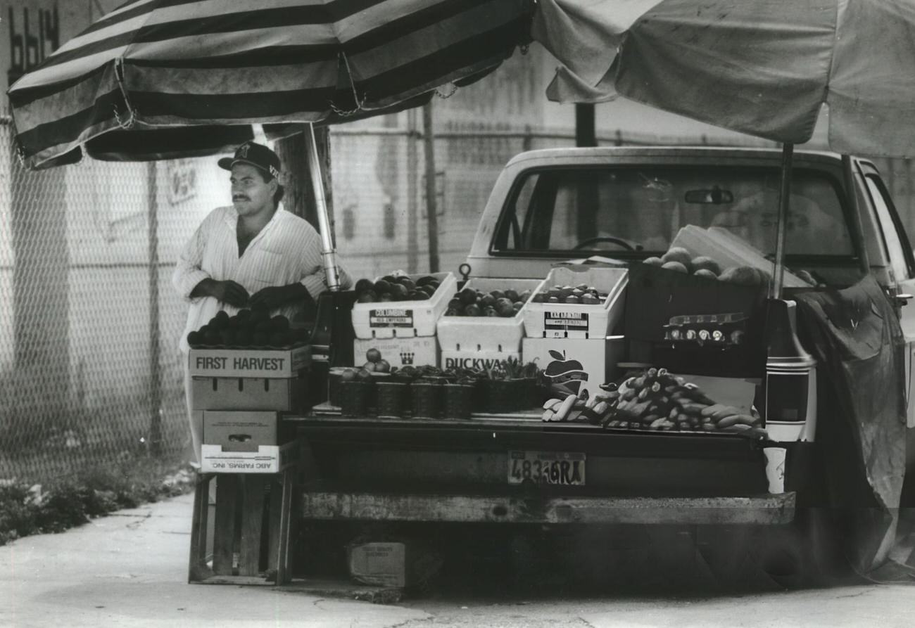 Victor Villejas from Tampico, Mexico, contributes to the East End's vibrancy by selling fruit along Harrisburg, enriching Houston's cultural mosaic.