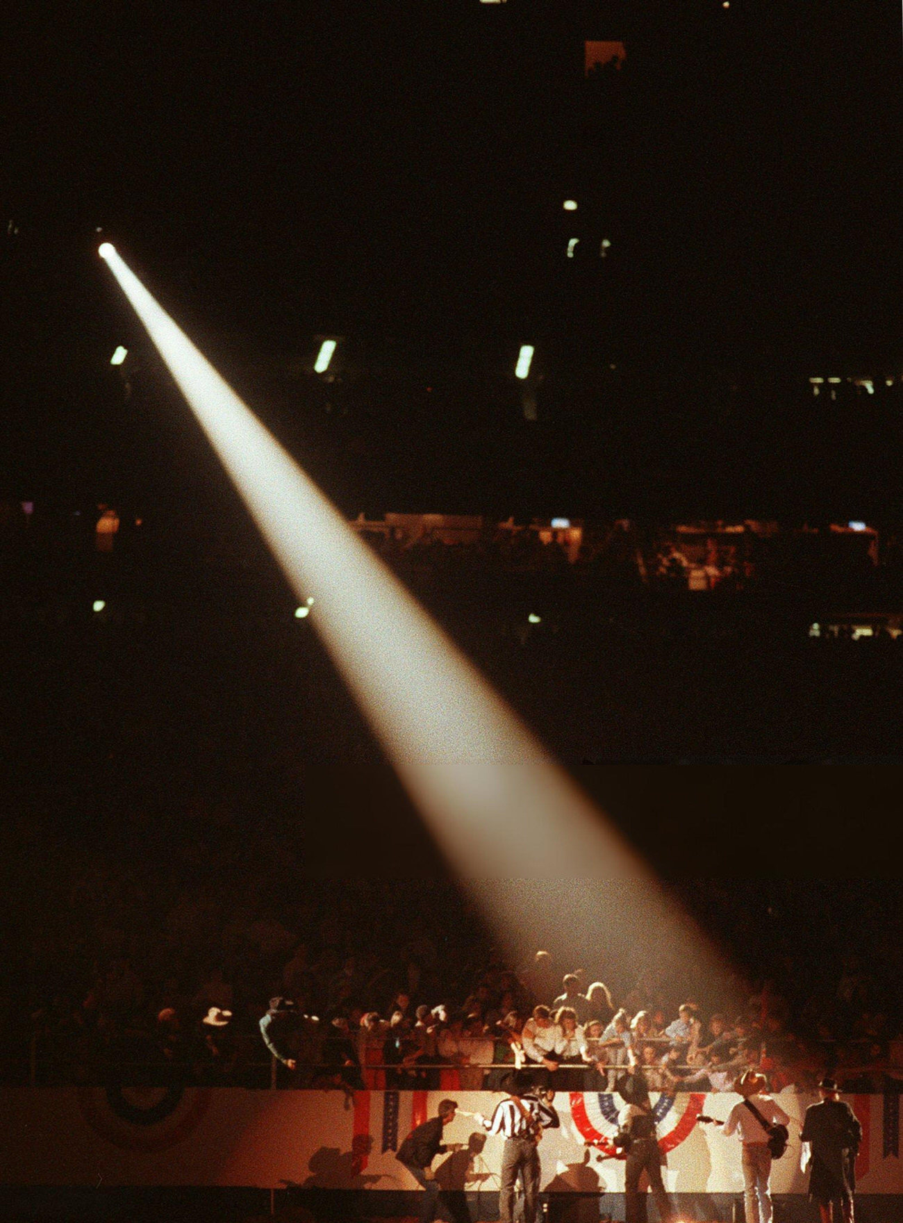 Garth Brooks's performance at the rodeo in the Astrodome captures the event's cultural significance, Houston, Texas, 1991.