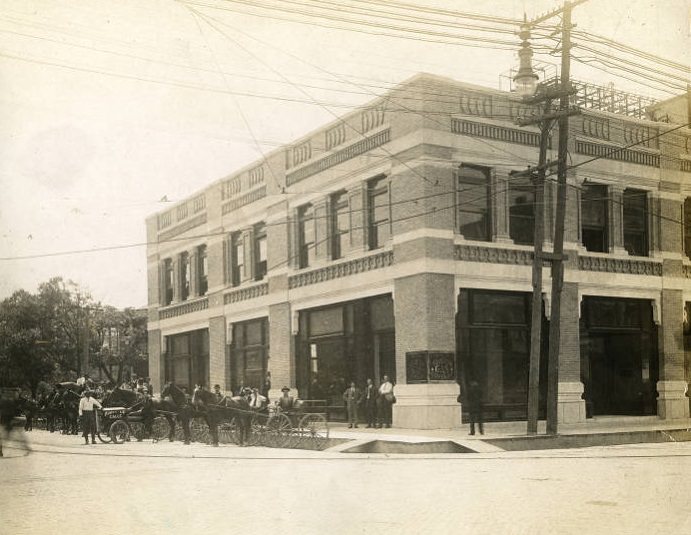 Houston Gas Company office with horse and wagons, 1880s