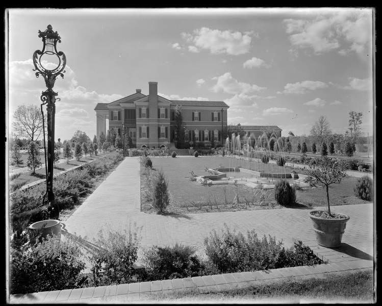 Street view of a mansion, 1920s