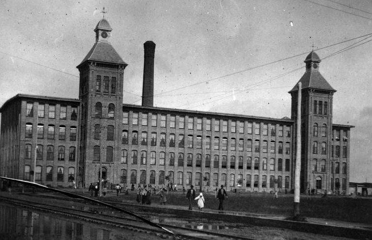 Lone Star Cotton Mills with people walking away, 1896.