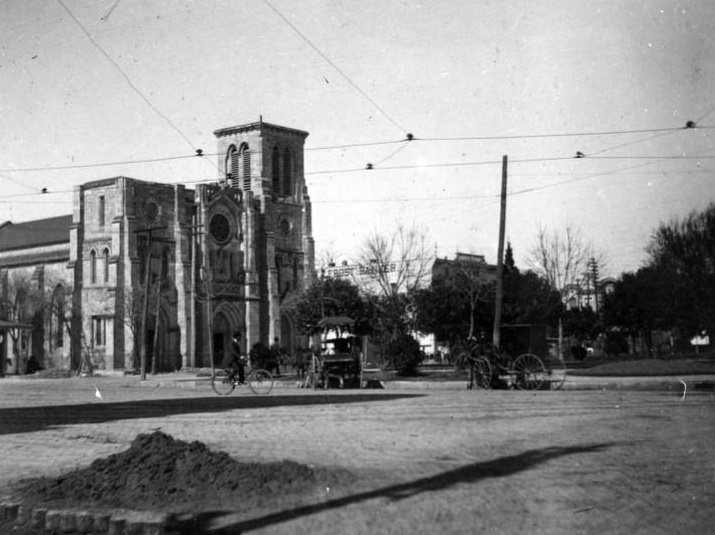 Old Cathedral with carriages and bicycle, 1897