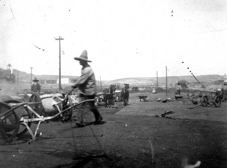 Workers at a smelter, 1895