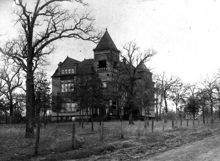 Normal School in Denton with chicken wire fence, 1897