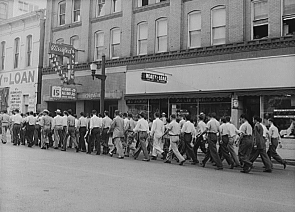 Inducted men marching to the reception center in Houston, Texas, 1943