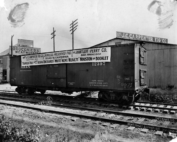 Railroad freight car at J. C. Carpenter Fig Company, 1909.