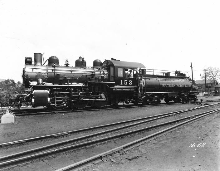 Two men on a locomotive train, Houston, 1890s