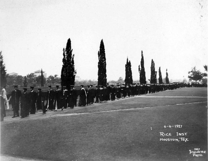 Rice Institute graduates walking to ceremony, Houston, June 6, 1927.
