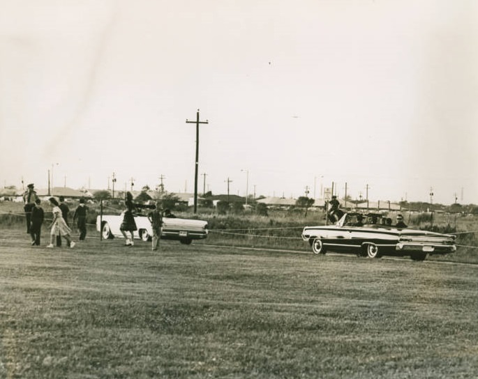 Children watching President Kennedy motorcade, Houston, 1962.