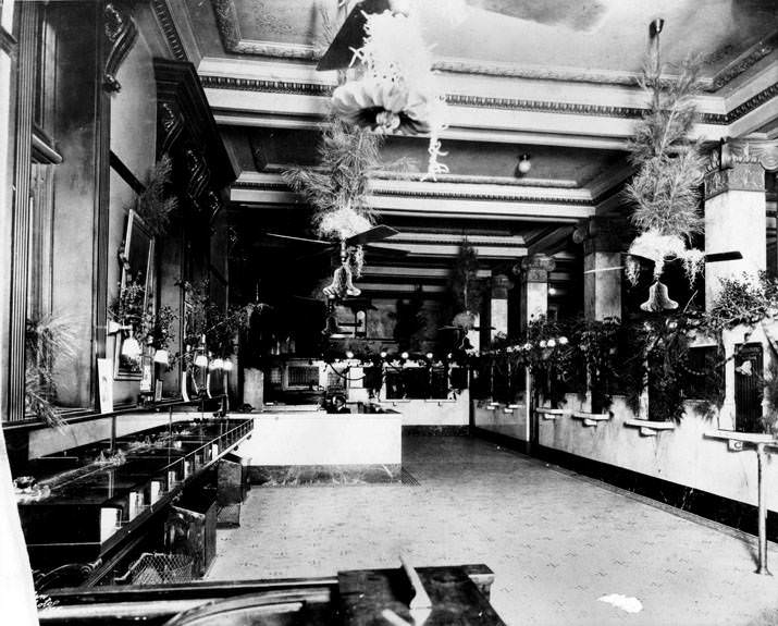 Bank lobby decorated for Christmas, 1930s
