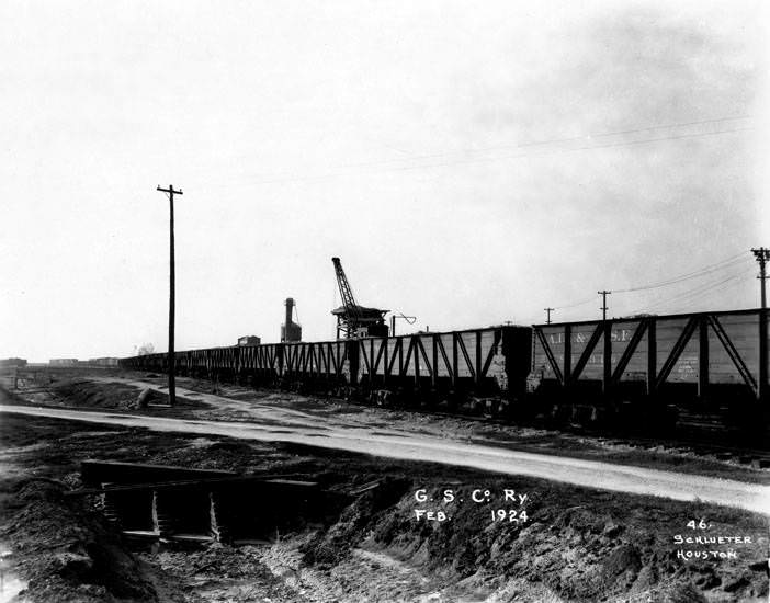Long line of railroad boxcars, Texas, February 1924.
