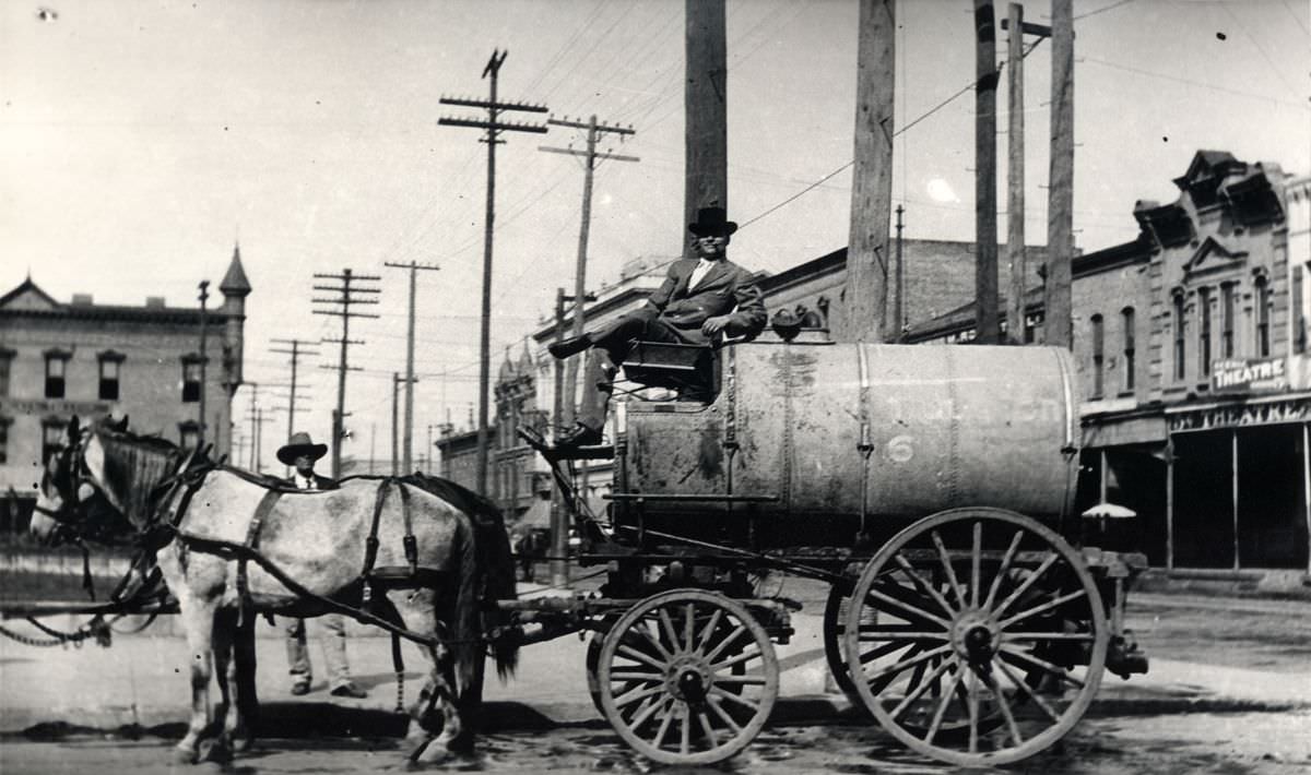 Horse-drawn water wagon, 1890s.