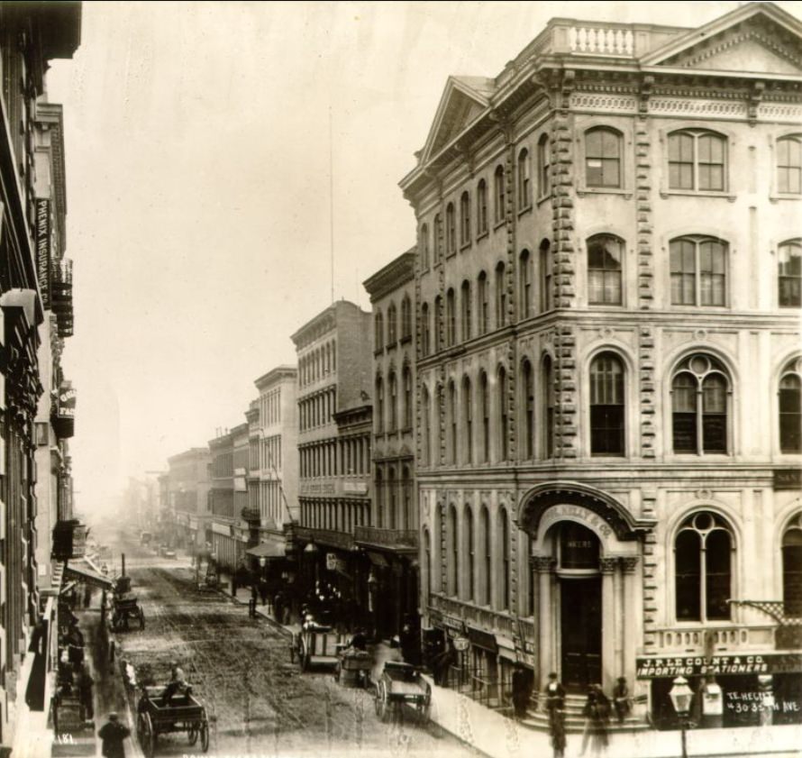 Down Sacramento Street below Montgomery, 1867