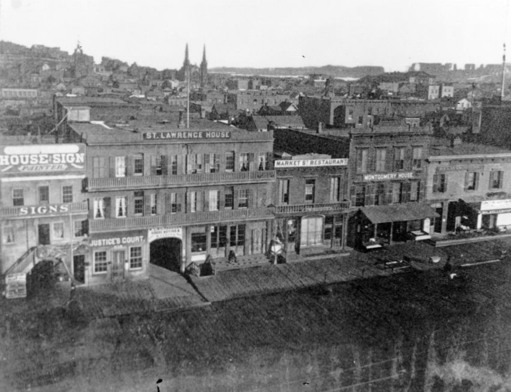 Market Street from Montgomery looking south, showing where New Montgomery Street was cut through, 1863