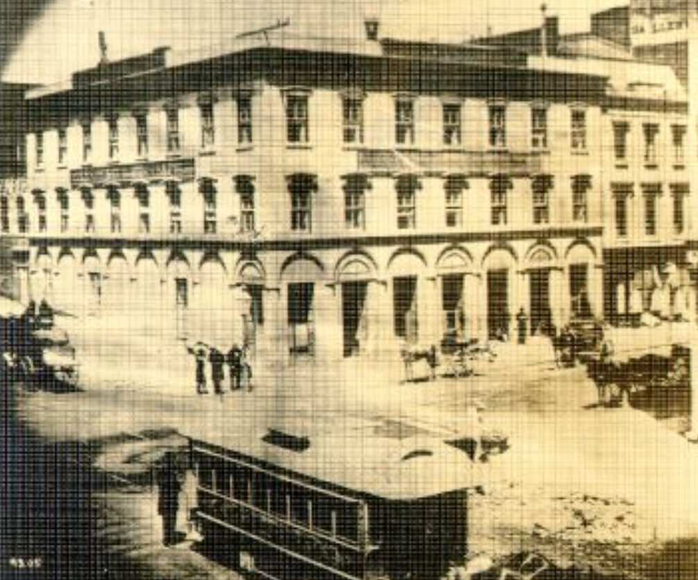 Cable car facing northwest at California and Montgomery streets, 1867