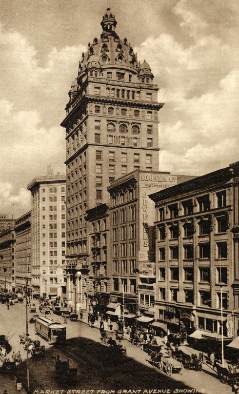 Market Street from Grant Avenue showing Claus Spreckels Building, Examiner Building, Monadnock Building, Palace Hotel, 1890s